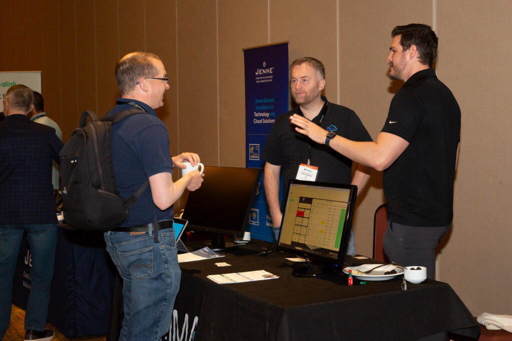 sponsor chatting with attendee