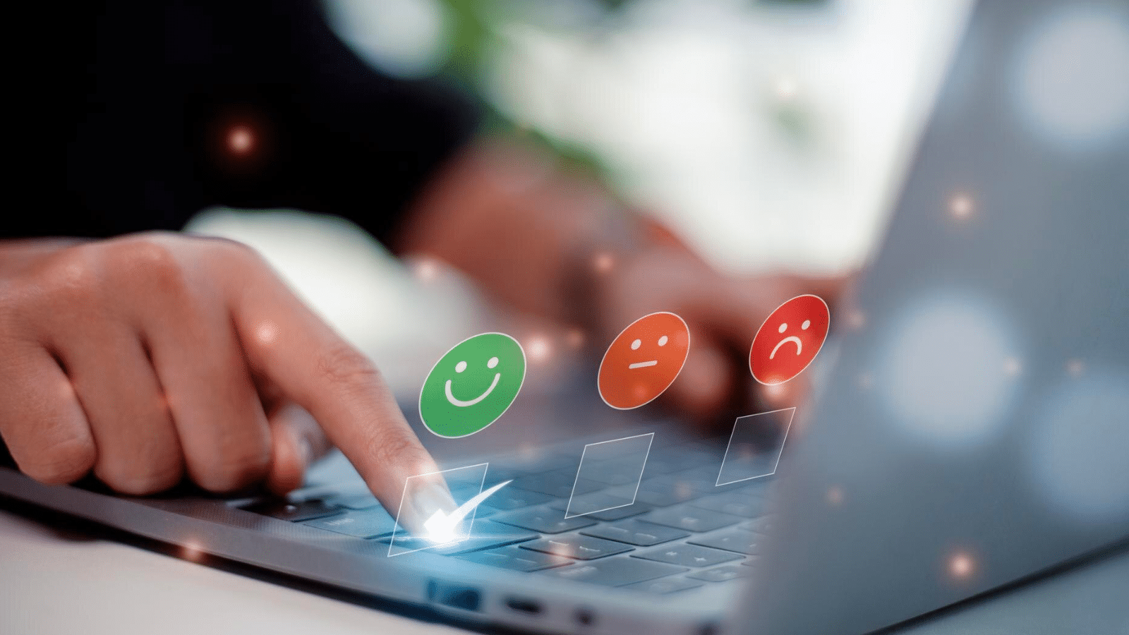 Person pressing button on laptop conveying satisfied customer due to call analytics and data helping to personalize calls.